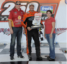 Mike Wallace with Steve and Alison Anderson after his victory at Talladega in 2011